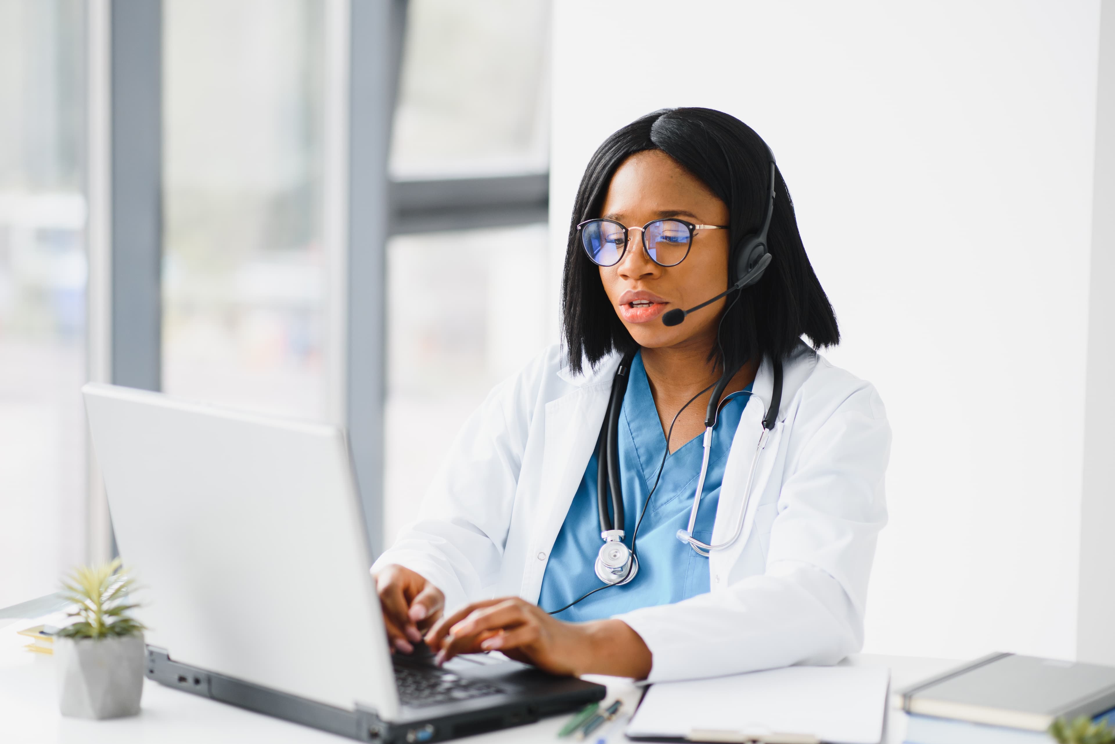 A Return Well clinician conducting a remote assessment